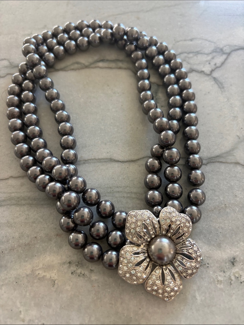 Triple-Strand Hematite Pearl Necklace with Sparkling Flower Clasp